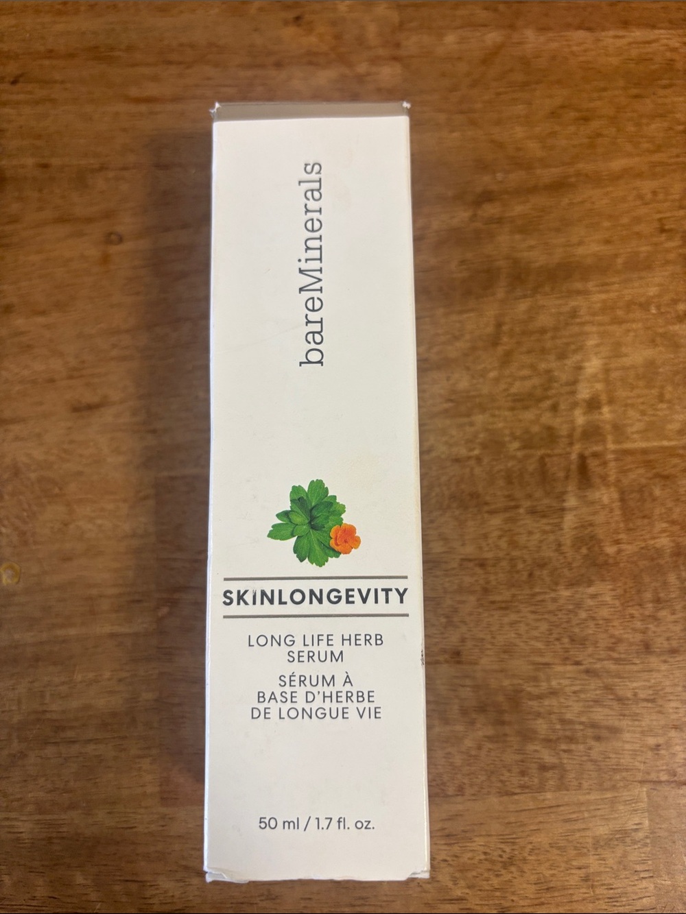 Authentic bareMinerals Skinlongevity Serum – White with Green and Orange Accent